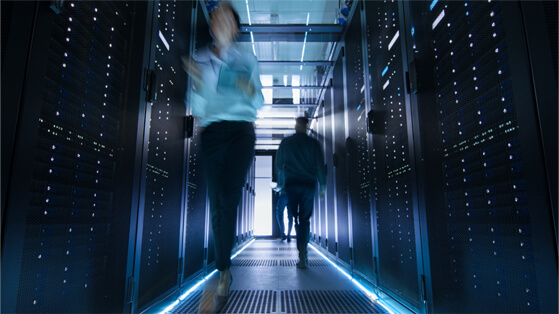 people walking in a data room