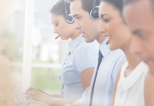 Three people with headsets on.